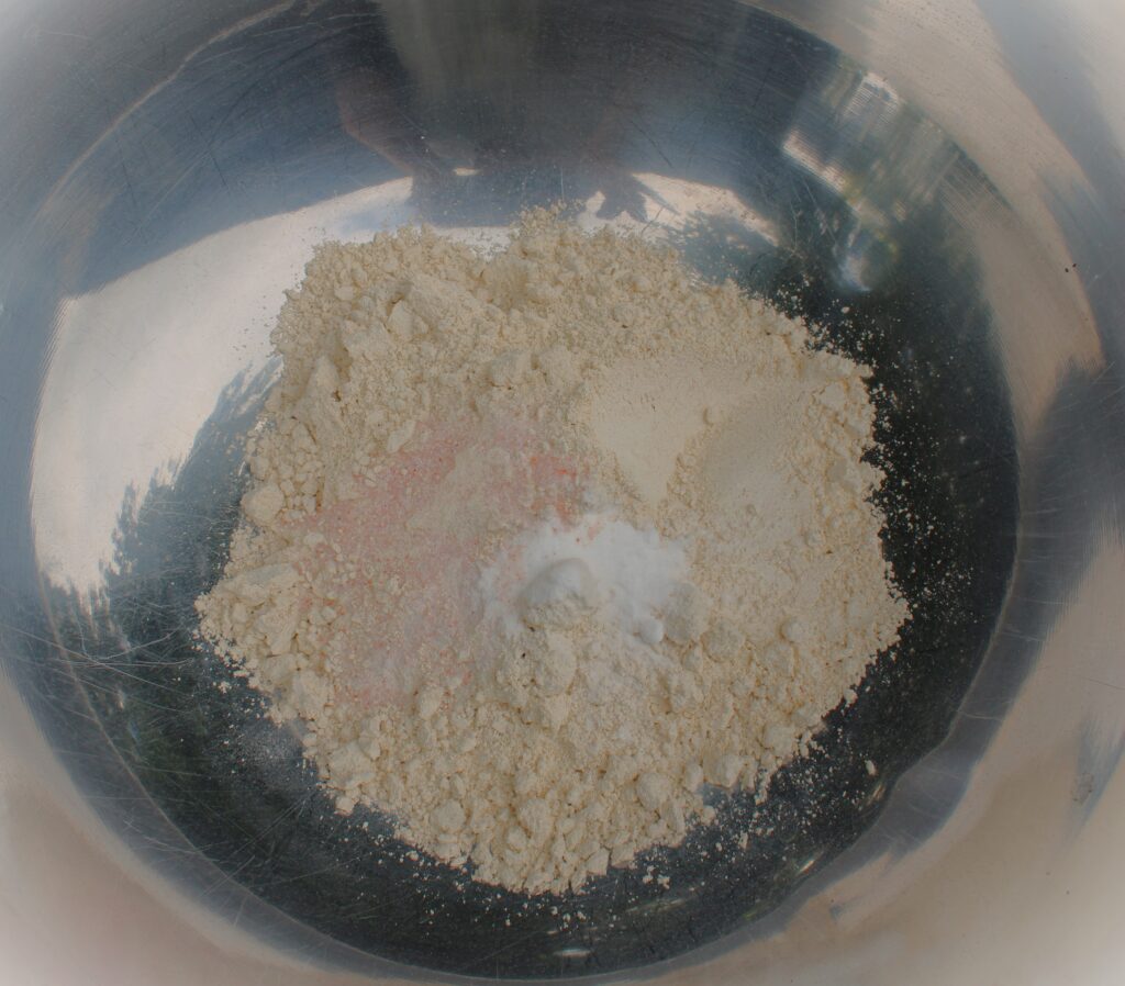 Dry ingredients in a bowl for the fresh milled blueberry muffins. 